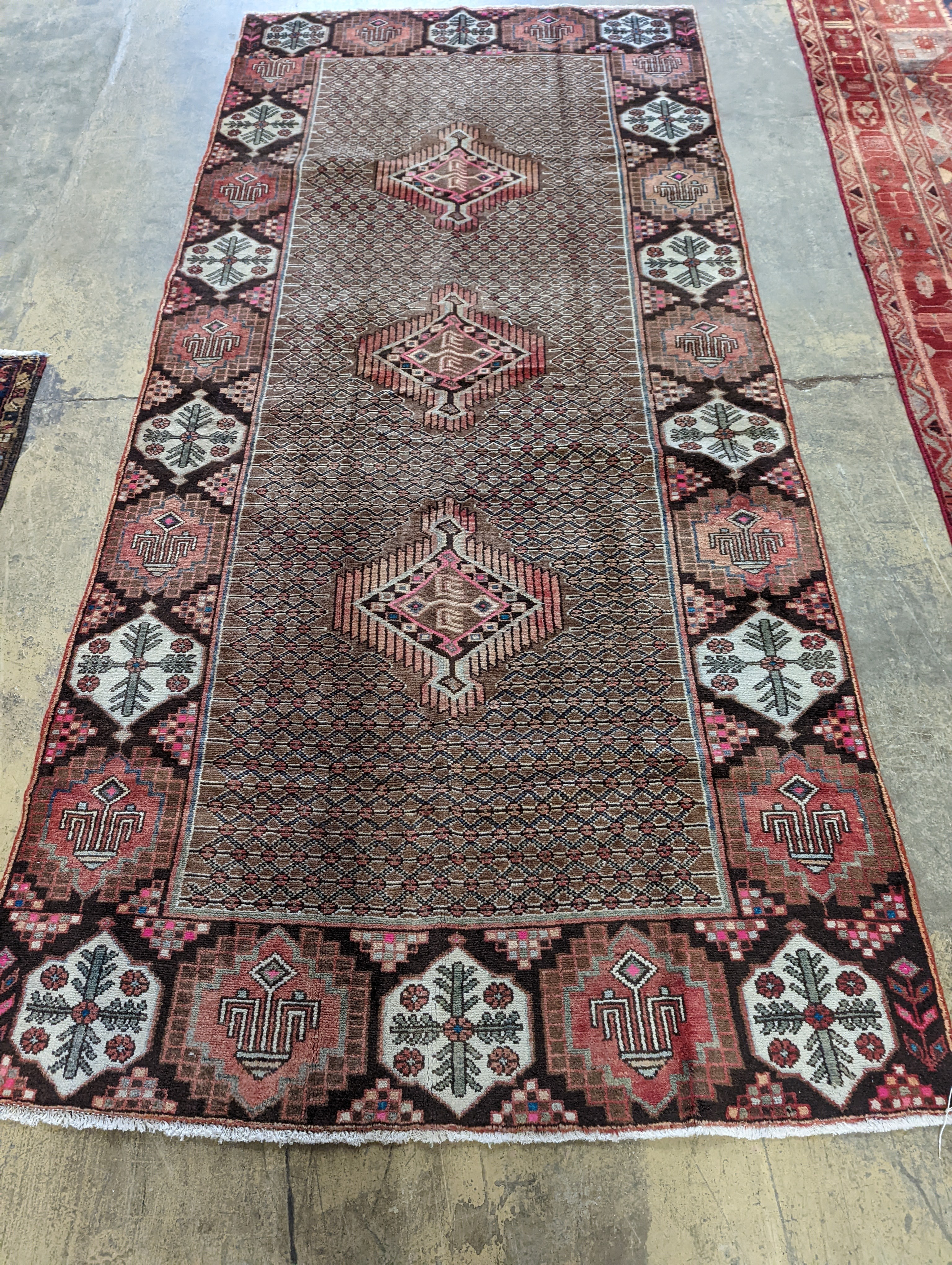 A Hamadan carpet, 320 x 146cm